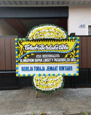 Papan Bunga Duka di Waliwis